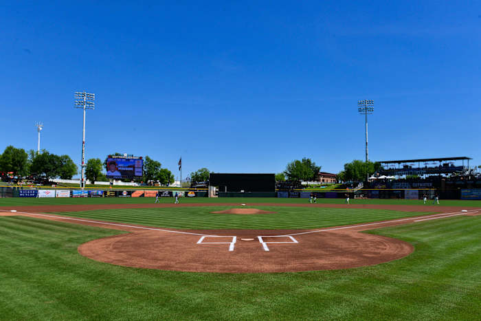 The SF Giants and Texas Rangers warm up before a game at Scottsdale Stadium. (2022)